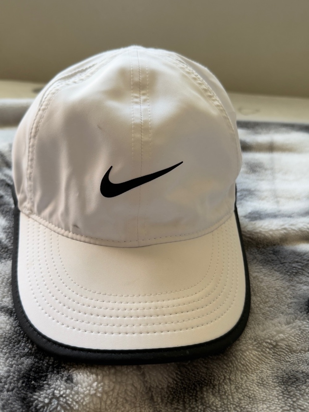 Nike White Baseball Cap with Black Swoosh and Trim